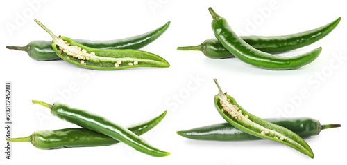 Fotografía Green chili peppers isolated on white, set