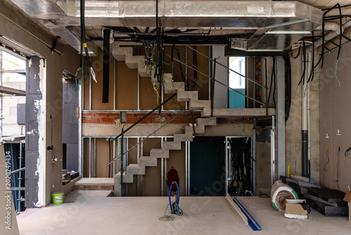 Unfinished residential building interior during construction process