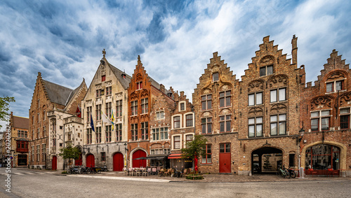 Fotografie Bruges, Belgium – 6 May 2026: A row of beautiful old houses with stepped gables