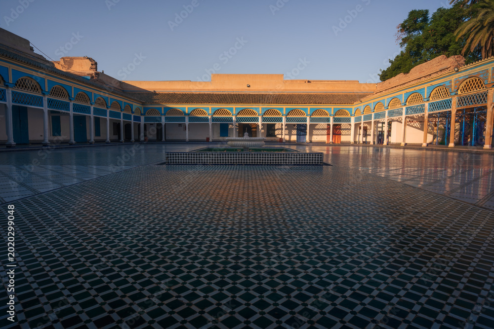Fototapeta premium Ancient Moroccan palace architecture with traditional courtyard in Marrakech, Morocco.
