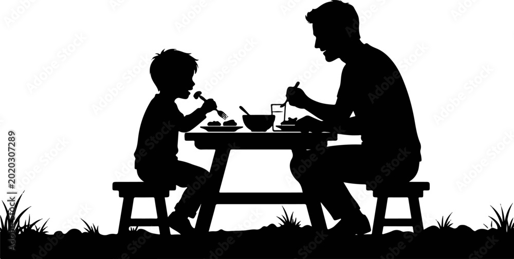 Fototapeta premium silhouette of a father and son sitting at a table and eating together outdoors