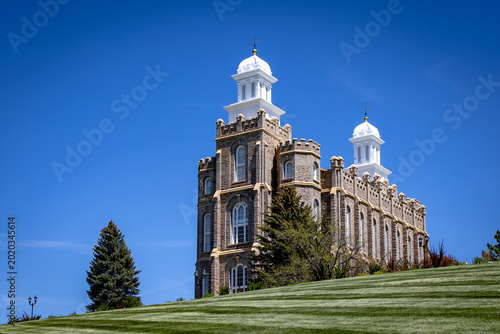 Logan Utah Temple Exterior Historic LDS Church Building with Mountains and Blue Sky