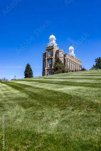 Logan Utah Temple Exterior Historic LDS Church Building with Mountains and Blue Sky