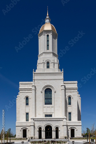 Logan Utah Temple Exterior Historic LDS Church Building with Mountains and Blue Sky
