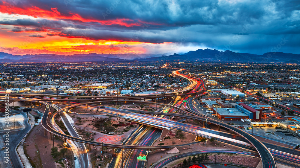 Εκτύπωση καμβά Aerial Las Vegas Spaghetti Bowl Highway Downtown Cityscape at Golden Hour