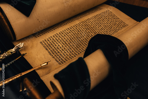 Obraz na płótnie Hebrew religious handwritten Torah parchment scroll, close up