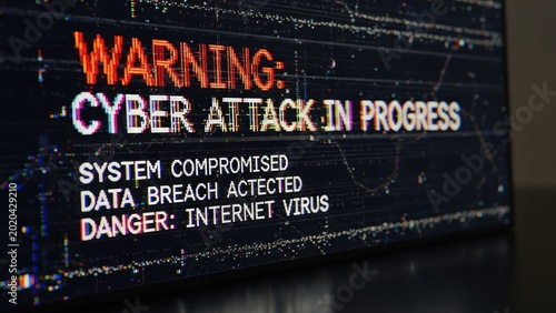 Digital warning display showing cyber attack alert on a computer screen representing data security