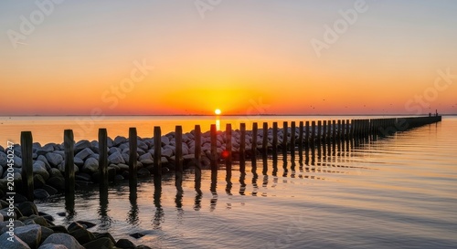 Tranquil Sunset Over the Ocean with Wooden Pier.