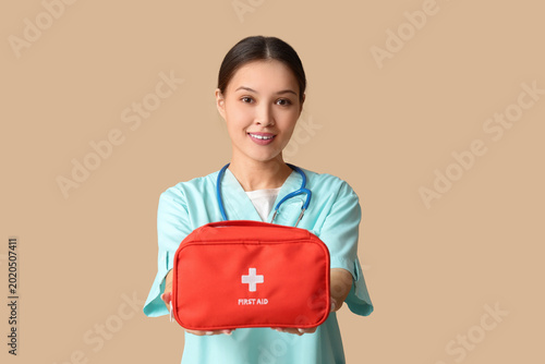 Asian female doctor with fi...