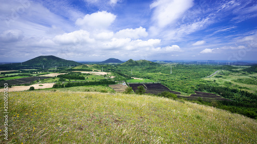 Obraz na płótnie Whenever spring came, a harsh wind would always linger! Unique landscape of Baekyaki-Oreum(small extinct volcano) in spring, Jeju Island, South Korea