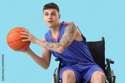 Male basketball player in w...
