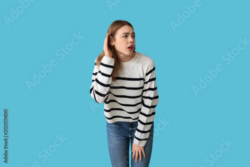 Beautiful young woman tryin...