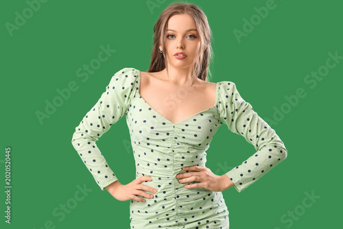 Beautiful young woman in st...