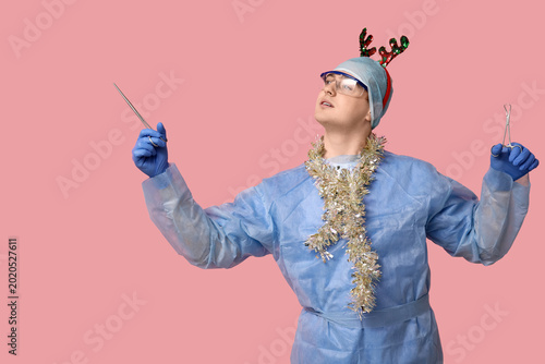 Portrait of young male surg...