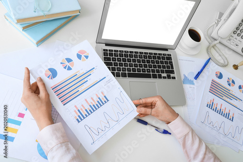 Business analyst reviewing ...