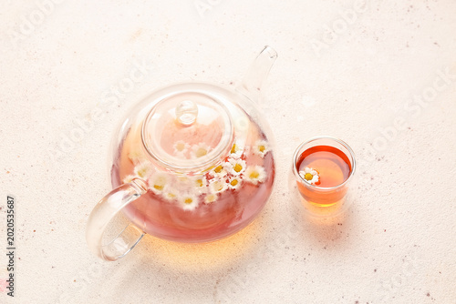 Teapot with cup of natural ...