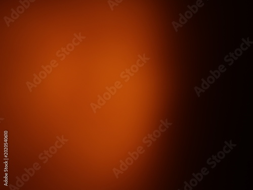 Foto Una toma de cerca de un fondo abstracto de color anaranjado con negro con un lig
