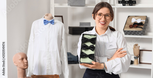 Female sales assistant with...