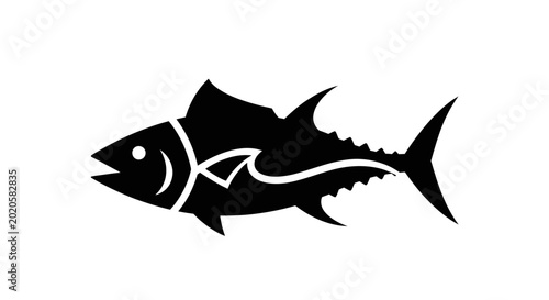 Bilde på lerret Tuna swims gracefully in this artistic black silhouette icon representing marine life