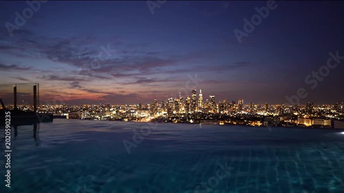 Rooftop Infinity Pool with Twilight Reflection