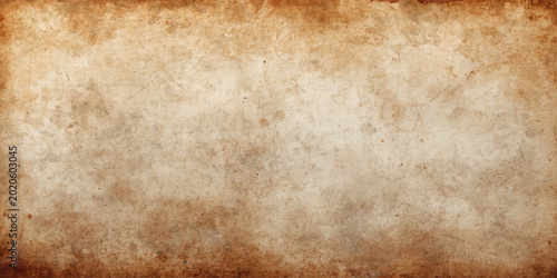 Vintage aged parchment with a stained brown grunge texture and worn antique paper pattern creates a blank retro background for a grungy design