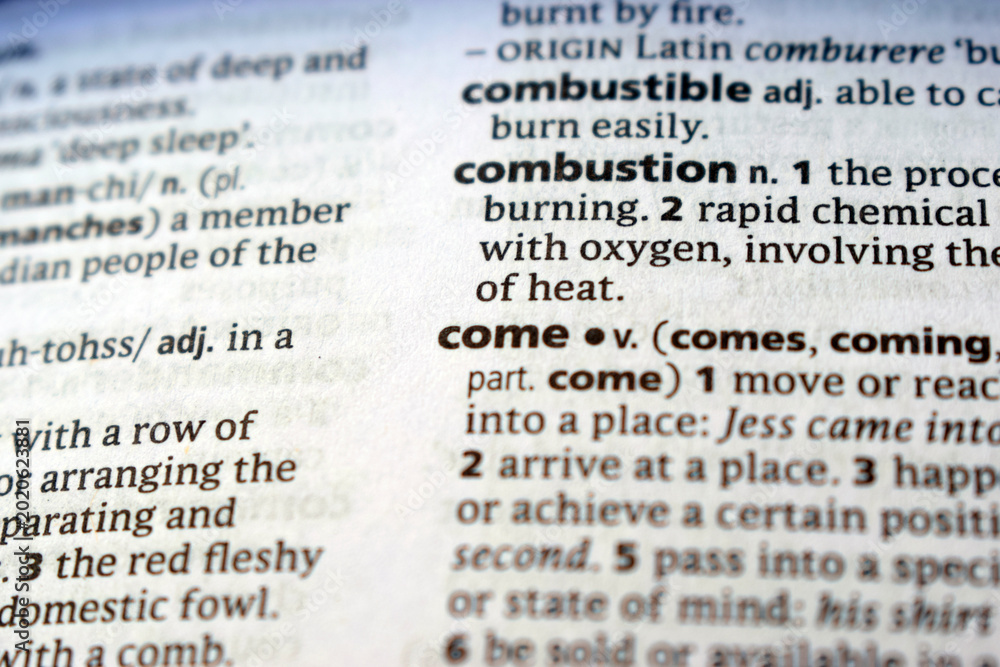 Fototapeta premium Detail Of English Dictionary Page And Word Pronunciation Of - come