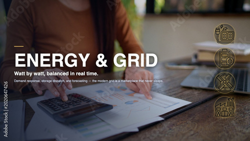 Asian women hand using calculator analyzing energy grid data report on paper document reviewing electricity consumption statistics for sustainable power