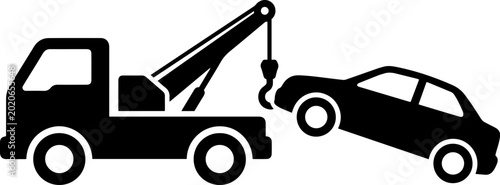 Foto Black silhouette icon of a tow truck pulling a car