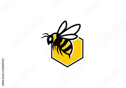 Bild auf Leinwand Bee on yellow hexagonal honeycomb cell logo
