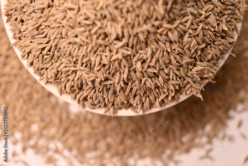 Cumin Seeds in Bowl Top View with Defocus Background Macro Photography