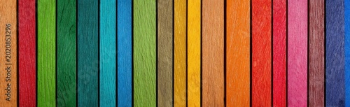 A Vibrant Rainbow of Colored Pencils Lined Up Vertically.