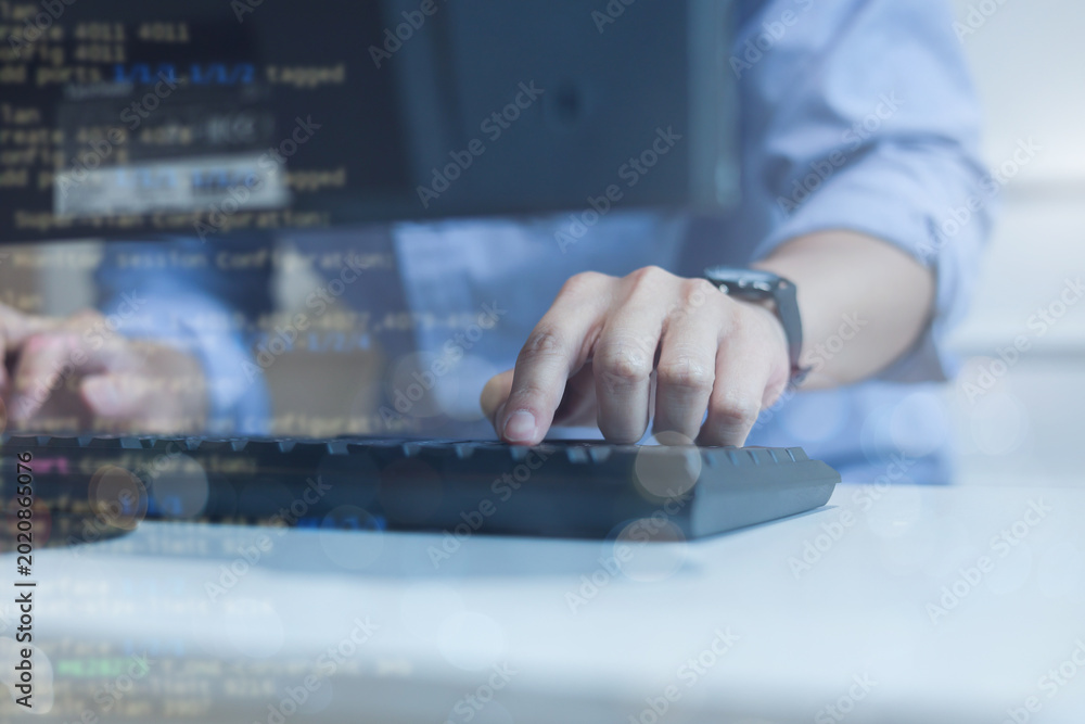 Fotografie close up computer programmer man hand typing configuration on keyboard at laptop