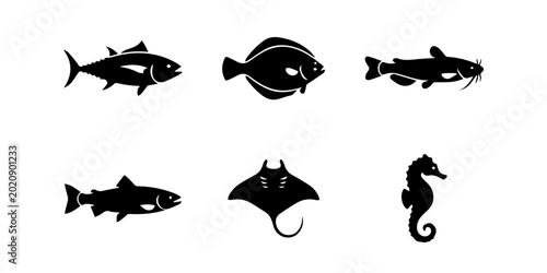 Black silhouettes of various ocean fish