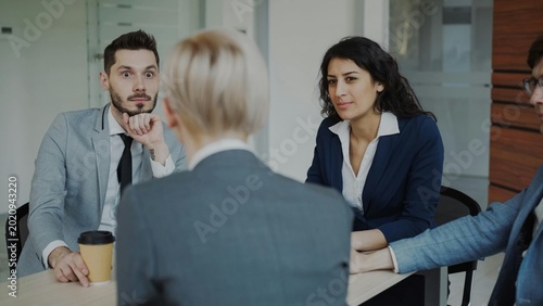 two business women talking on the phone