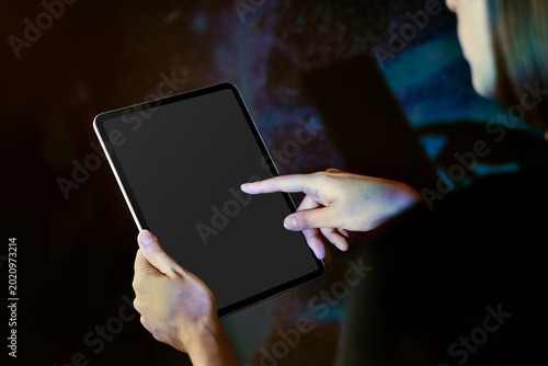 Person using blank digital tablet screen