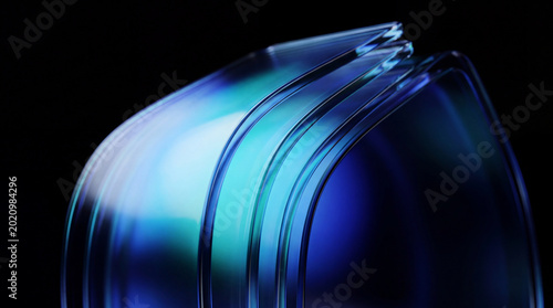 Fotografija Modern abstract close-up of folded transparent blue and teal glass sheets creating a layered, futuristic design
