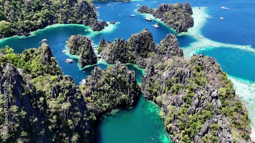 Views of the lagoons of Coron Island in the Philippines, blue loguna, drone flight