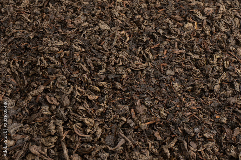 Fototapeta premium Dried tea leaves as a background.