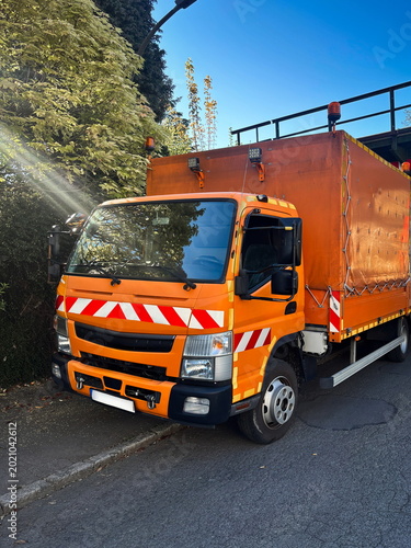 job truck orange red white stripes spray