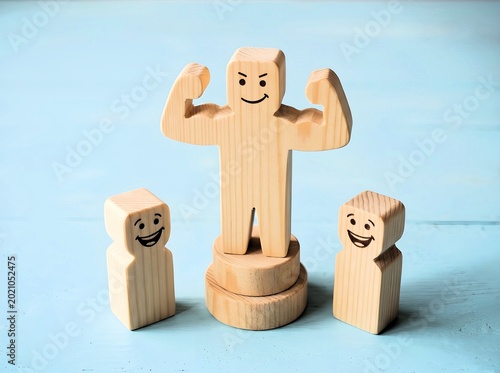 Wooden Figure Flexing Muscles on Pedestal Representing Leadership Strength and Success