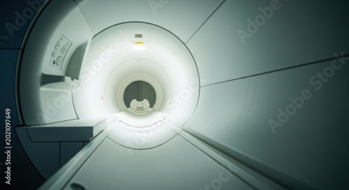 Person undergoing mri scan inside machine