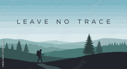 Tableau sur toile A silhouette of a lone hiker with a backpack walking on a path in the mountains