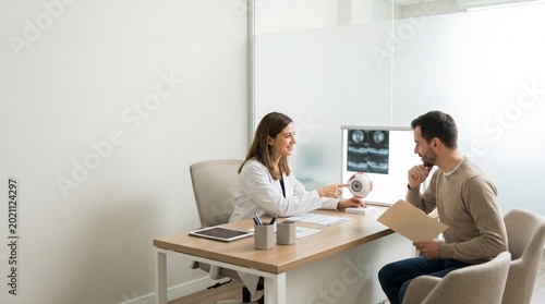 Doctor consultation after laser eye therapy in eye clinic