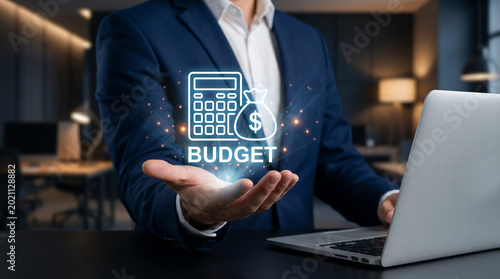 Budget concept with businessman presenting digital icon for corporate finance and accounting workflow