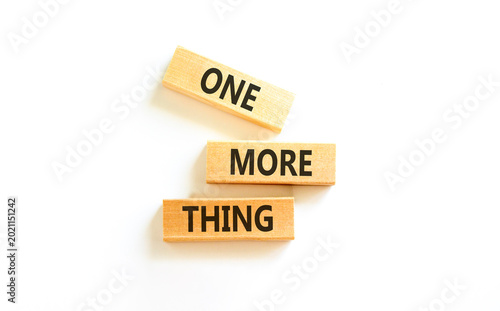 One more thing words symbol. Concept words One more thing on beautiful wooden blocks. Beautiful white background. Business and one more thing concept. Copy space.