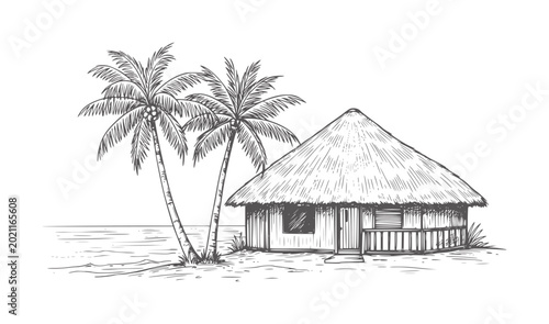 Photos Tropical thatched hut with palm trees a beach beside the ocean