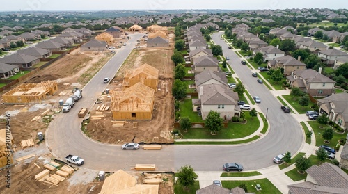Aerial View of New Housing Construction and Established Suburban Neighborhood