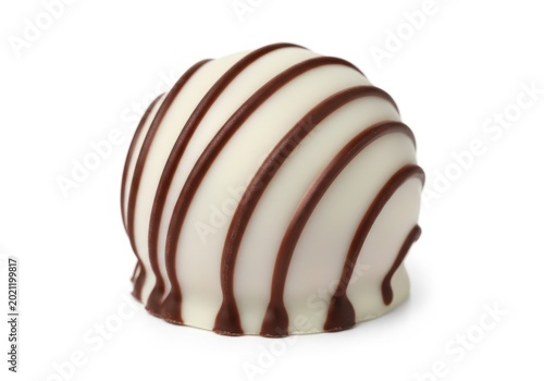 White chocolate truffle with red stripes on top