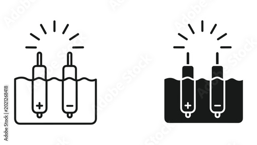 Obraz na plátně Battery icons with plus and minus signs in a container with wavy lines and rays