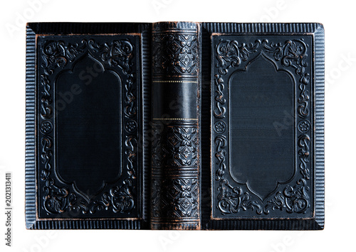 background. Classic religious book with aged craftsmanship, textured leather binding and historic character. Ideal for themes of Christianity, religion, spirituality, faith, history.